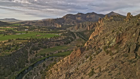 terrebonne oregon aerial v52 flyover smith rock state park, landscape of crooked river winding through the majestic rock formations with stunning asterisk pass - shot with mavic 3 cine - august 2022