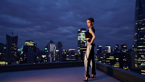 fashion model on rooftop at night