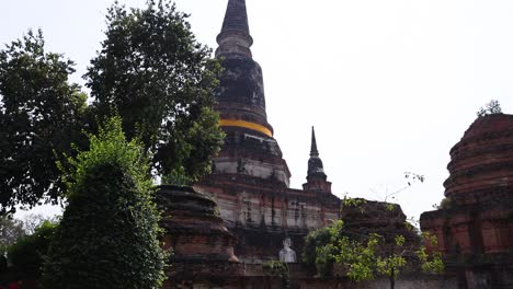 tourists visiting historic temple ruins in ayutthaya