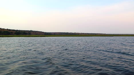 the chobe river view from a small dedicated photography boat