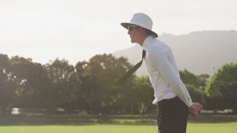 Cricket-umpire-making-signs-standing-on-a-cricket-pitch