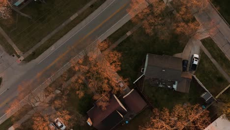 Direct-aerial-over-the-golden-splashed-streets