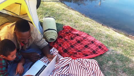 Father-and-son-using-a-laptop