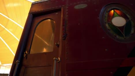 Panning-to-left-panoramic-view-of-luxury-design-of-elite-locomotives-and-stately-ride-at-the-railway-museum-in-Temuco,-Chile