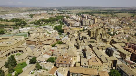 aerial view of a historic spanish town featuring a cathedral and bullring