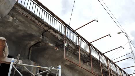 exposed support and cracks signal major infrastructure deterioration in riga