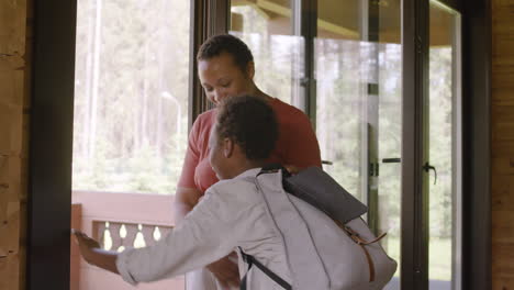 Boy-Saying-Goodbye-To-His-Happy-Mom-And-Leaving-Home