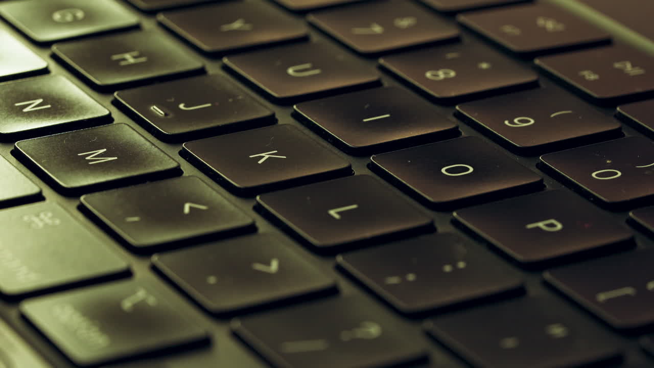 Close-up Hand Typing Keyboard Of A Laptop Computer.