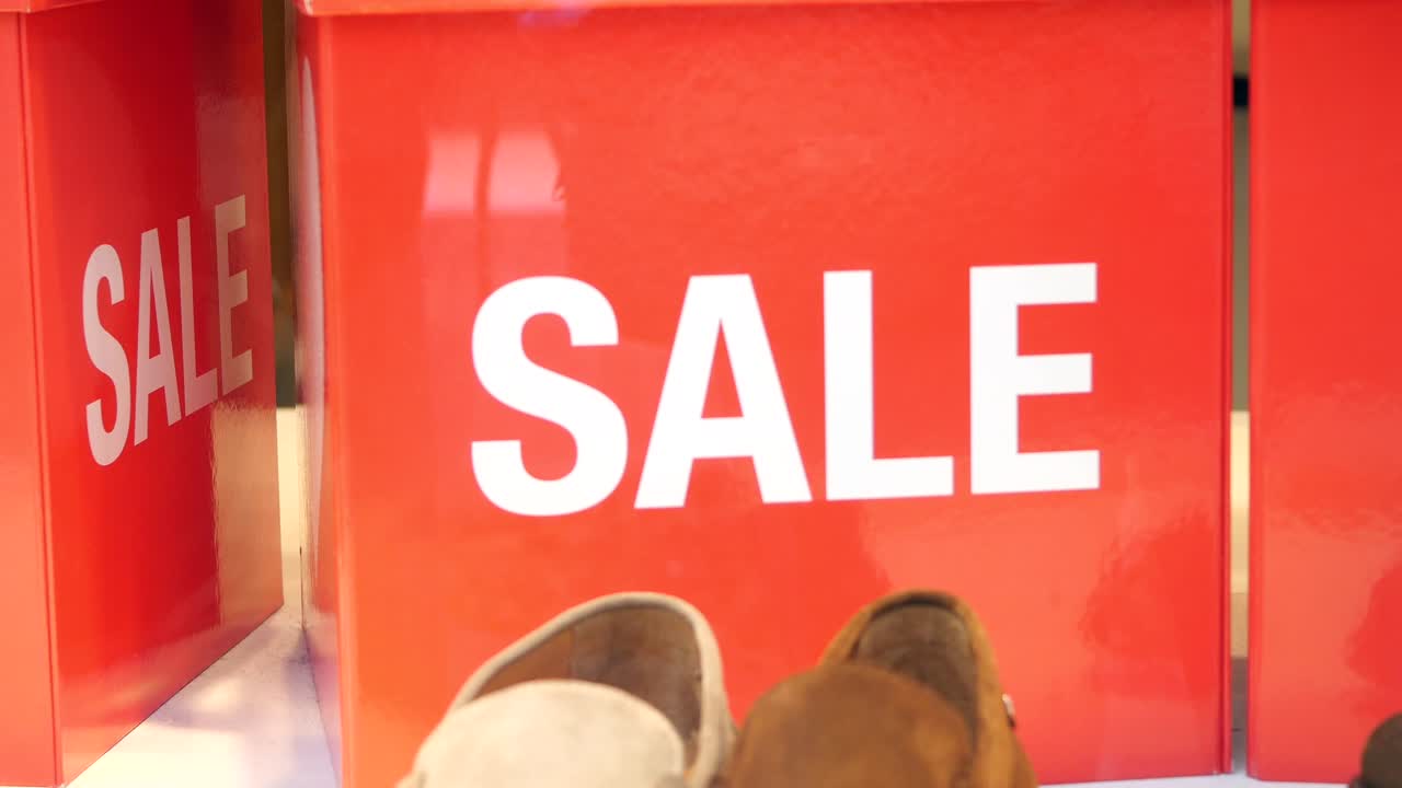 Red Sale Signs and Shoes