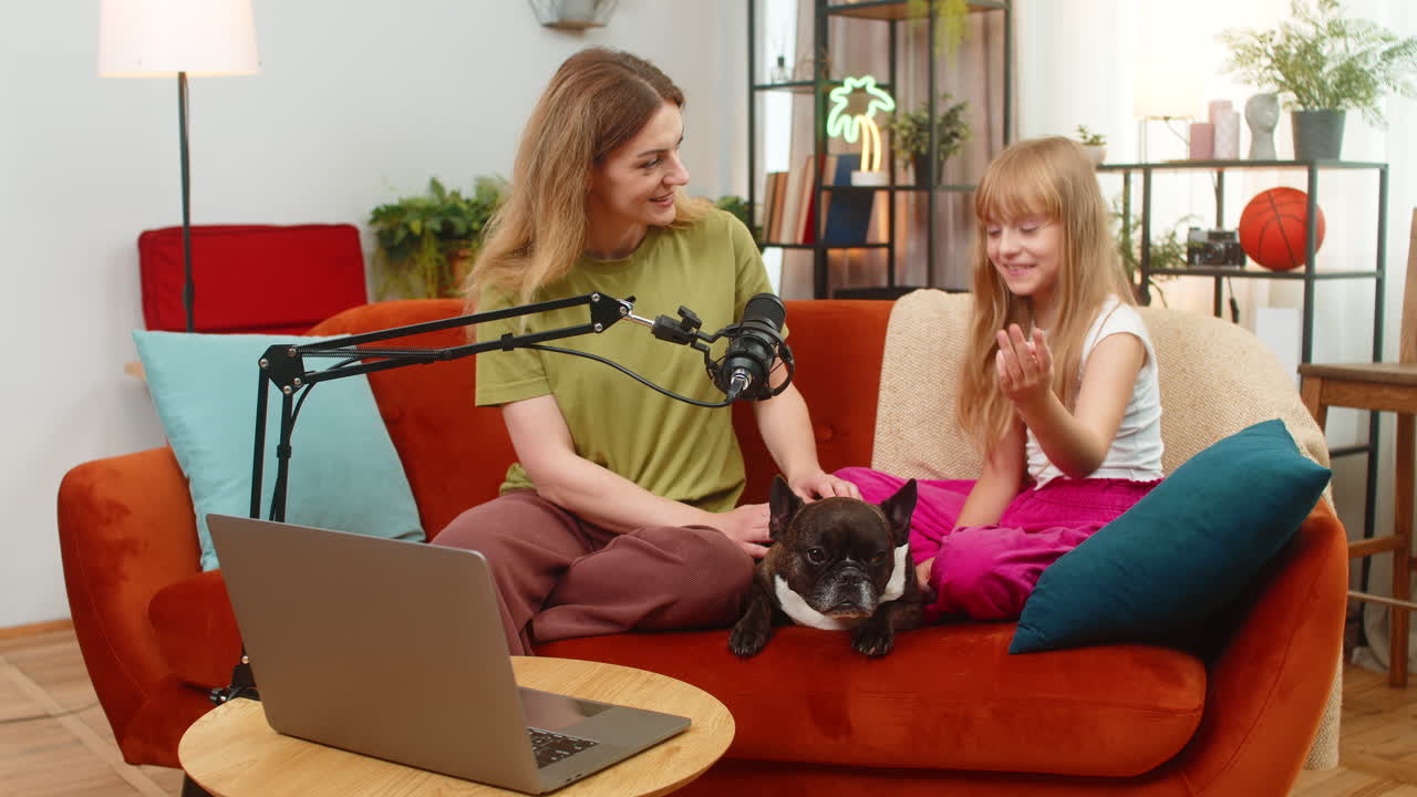 Mother daughter dog podcast with studio microphone pet care tips family hacks live talk record show