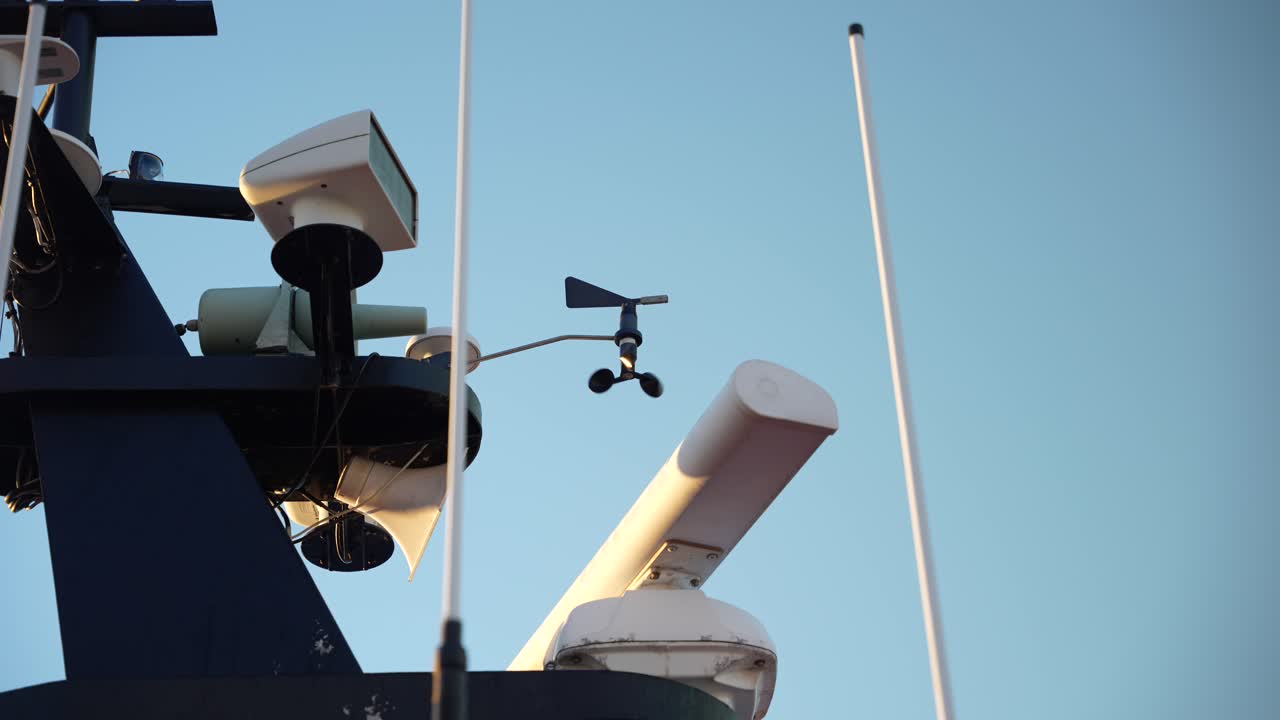 Close-up of a small boat anemometer spinning in gentle morning wind
