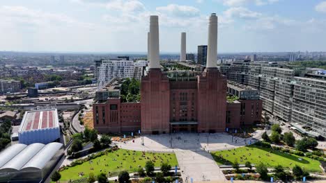 drone footage showcasing battersea’s skyline with the river thames, battersea power station, and luxury riverside apartments in stunning cinematic detail