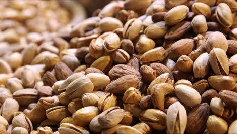 close up of pistachios gyrating in loop 4k