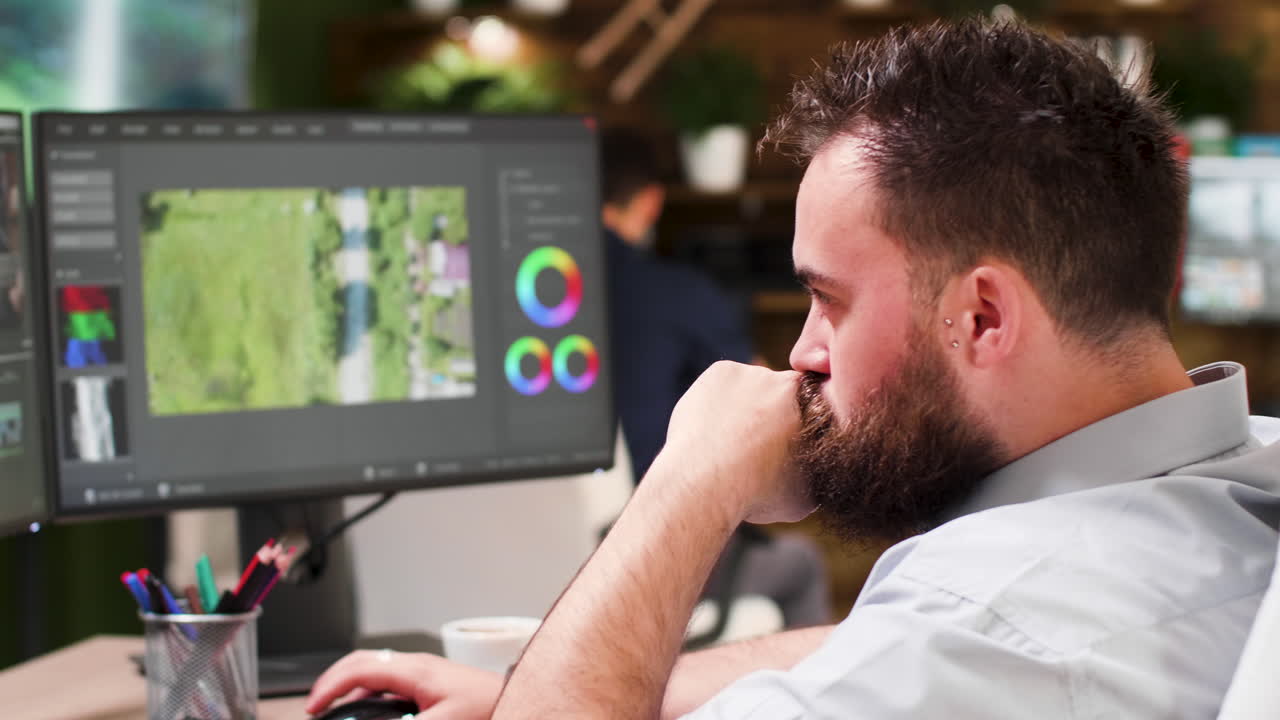 Man editing photos on computer
