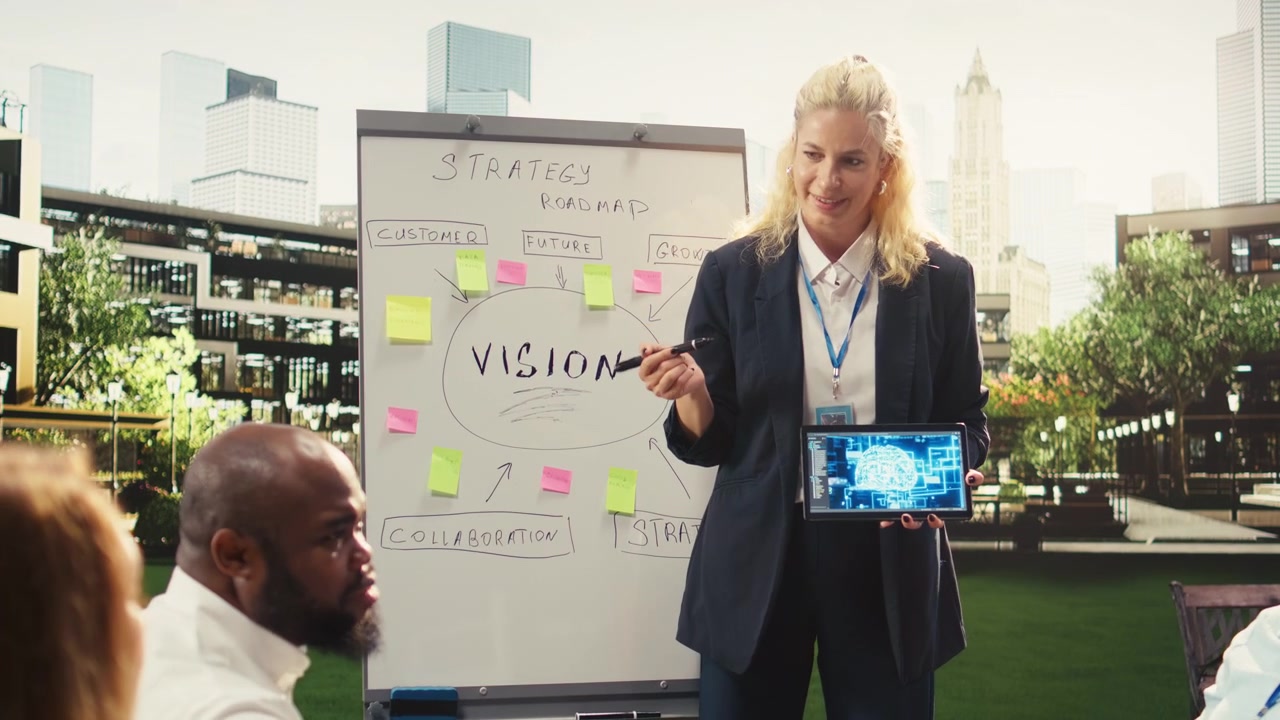 Businesswoman Presenting Artificial Intelligence Strategy to Team on Rooftop