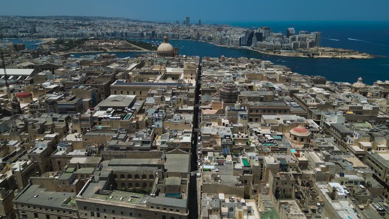 Pullback aerial reveal of Malta's capital city, Valletta
