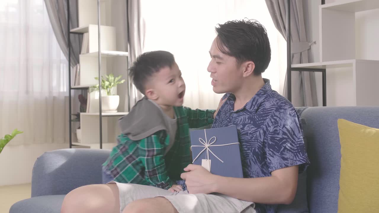 Father'S Day, Son Kiss His Father Holding Gift