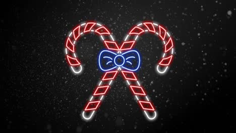 animation of snow falling over christmas candy canes