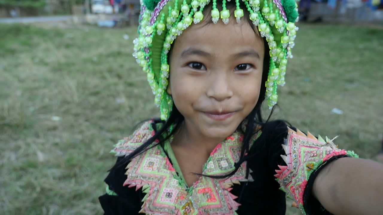 Smiling Ethnic Child in Traditional Attire
