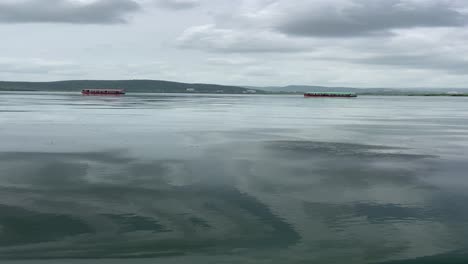 POV-Past-Calm-Reflective-Lake-Waters