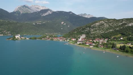 Shore-side-Lake-Annecy-France--aerial--4K-footage