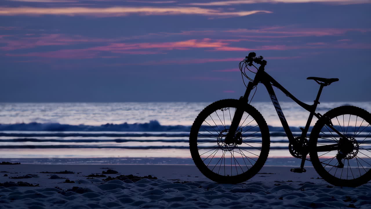 Sunrise on the Beach with Mountain Bike Silhouette