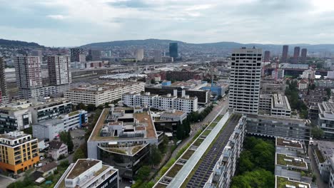 solar panels on roof of modern apartment complex in downtown of zurich city