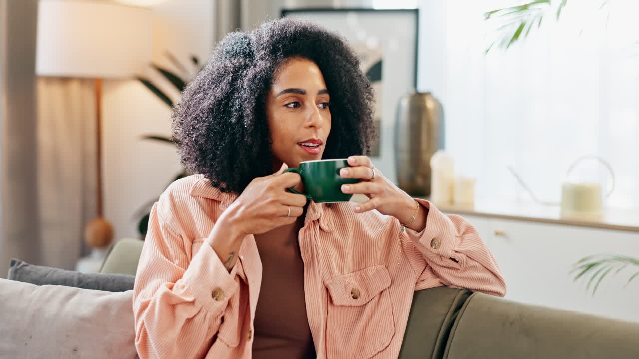 Woman relaxing at home with coffee