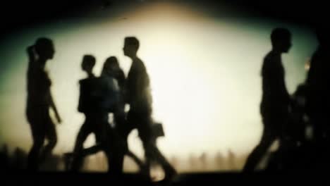 a dynamic urban scene captured in silhouette: commuters moving purposefully through a busy cityscape at dusk, evoking a sense of modern life and connectivity