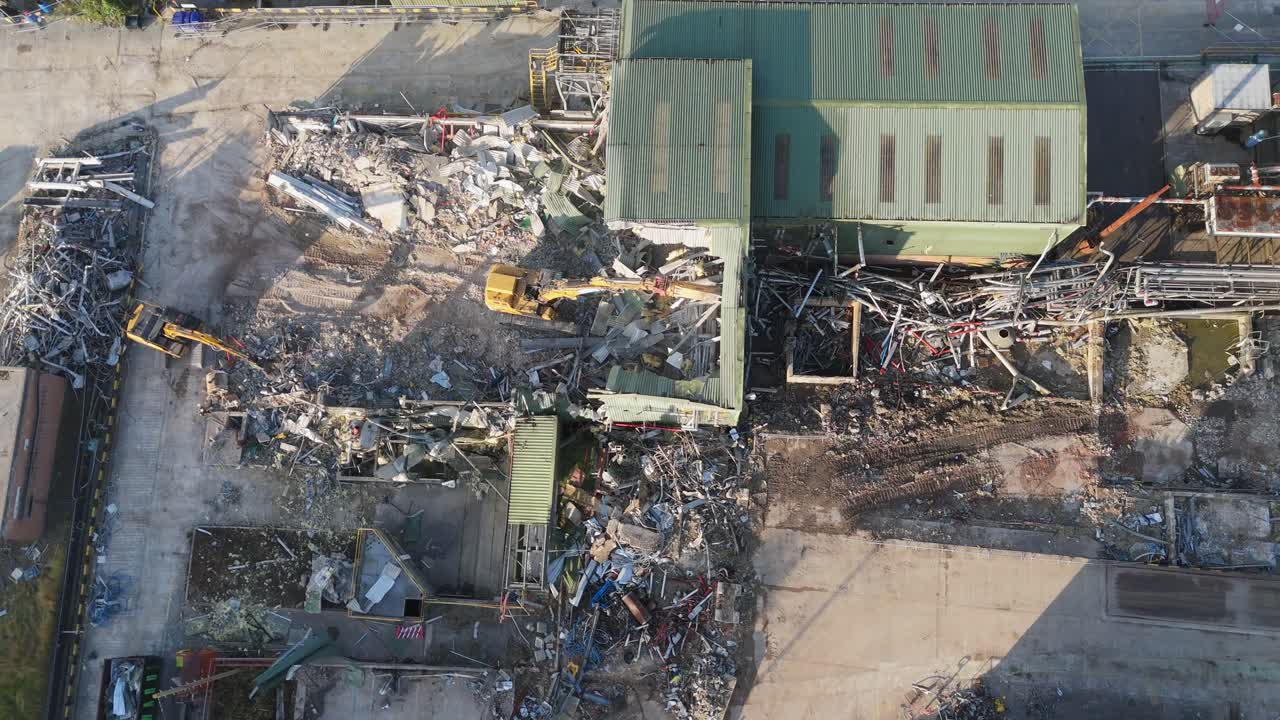 Chemical plant industrial demolition project. Decommissioning and demolition, removal and disposal of asbestos storage equipment, buildings and structural steelwork. Enviromental and global pollution