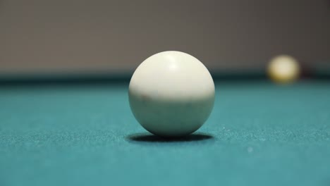 sinking the yellow 9-ball in a game of billiards