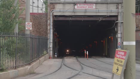 septa 13 trolley emerges from 40th street station tunnel, philadelphia, pa