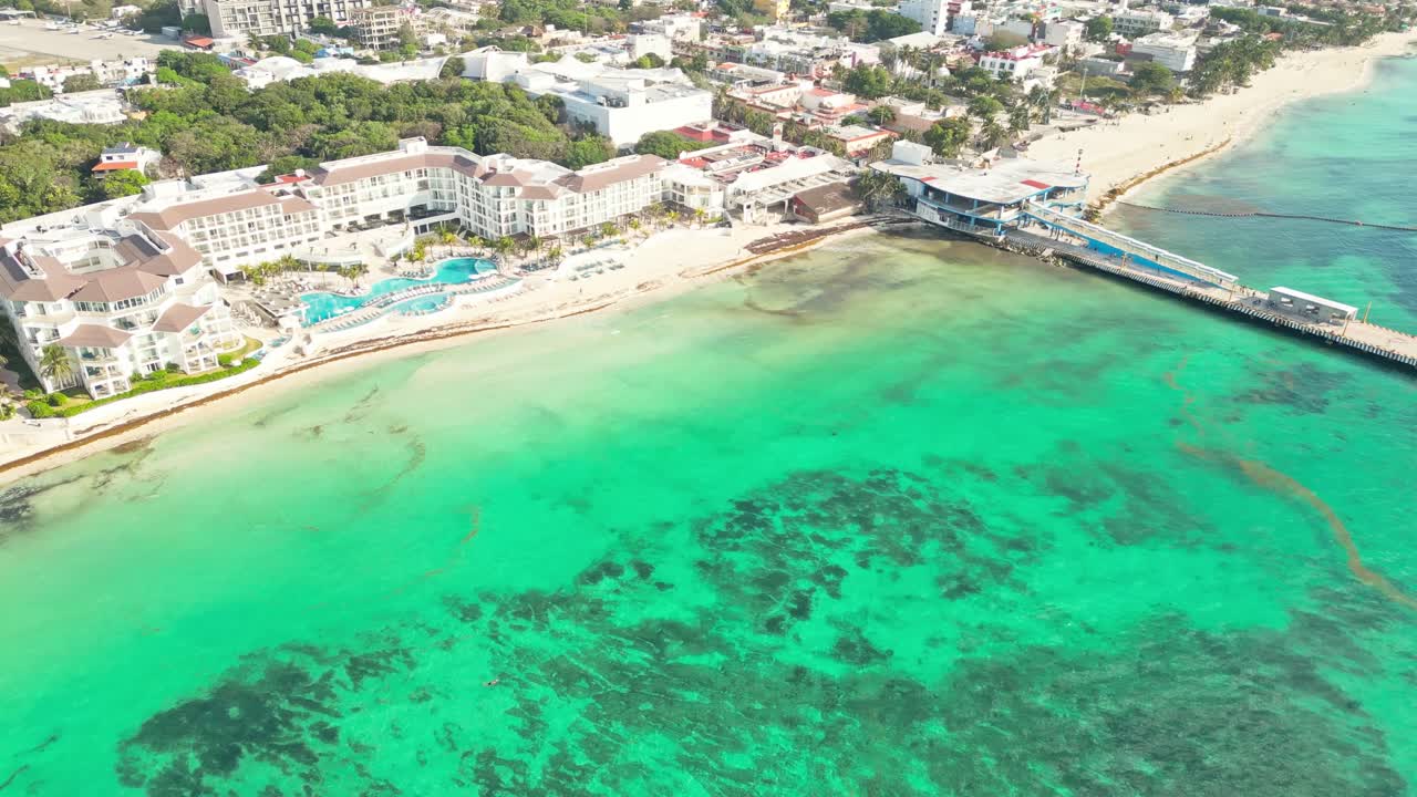 Tropical beach resort in playa del carmen, mexico, on a sunny day, aerial view