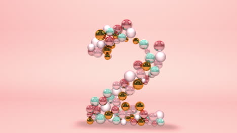 Number-2-made-of-beads,-glass-balls,-pastel-pearls,-crystal-jewels-and-gold
