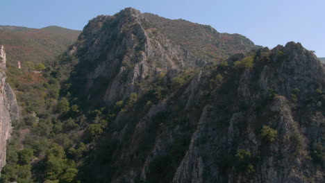 Drone-shot-of-cliff-in-Matka-canyon-in-Macedonia