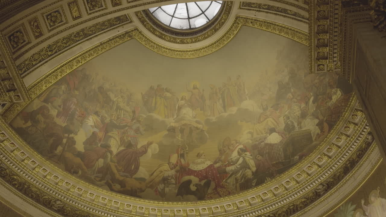 Vaulted ceiling and oculus of La Madeleine church, Paris, France. Low-angle pov