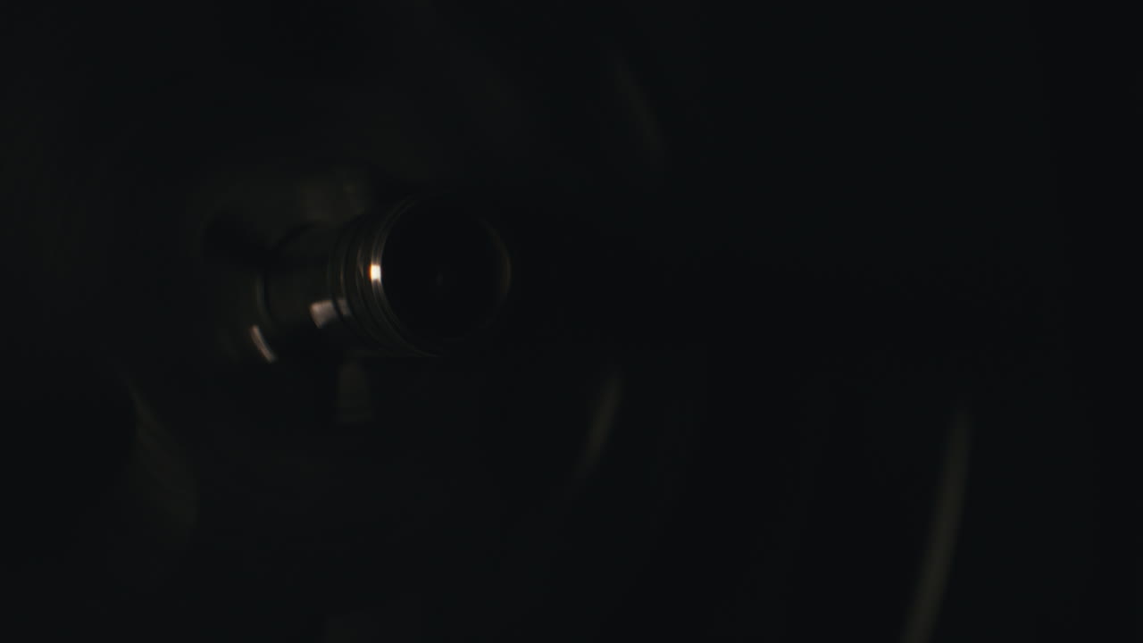 A vintage tape recorder in a blinking light