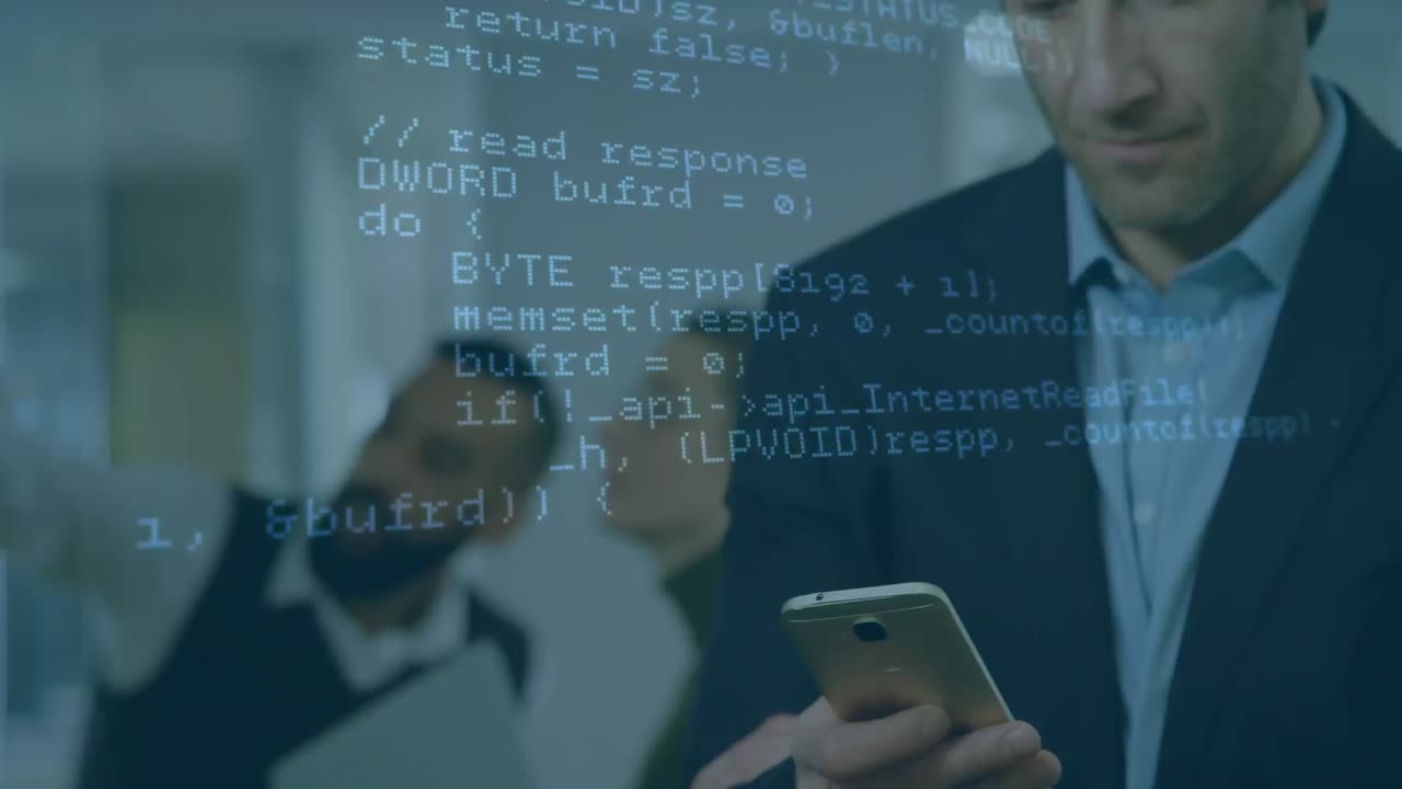 Animation of programming language over caucasian business man looking into cellphone at office