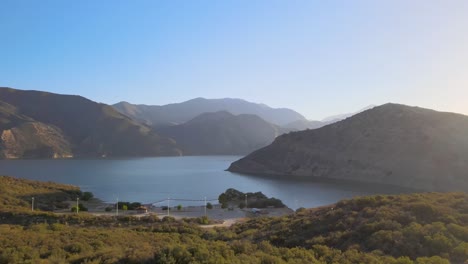 Pyramid-Lake,-located-in-the-Angeles-and-Los-Padres-National-Forests,-is-a-reservoir-formed-by-Pyramid-Dam-on-Piru-Creek,-near-Castaic,-California