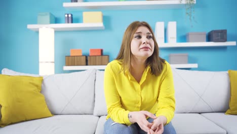 father trying to calm down his depressed daughter.