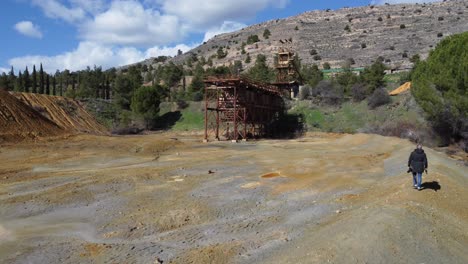 a photographer walks towards the mitsero mines, investigating the mitsero murders