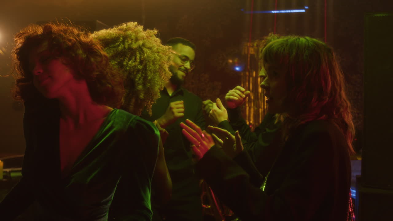 People dancing at a nightclub party