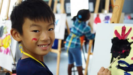 animation of falling hearts over two diverse children painting