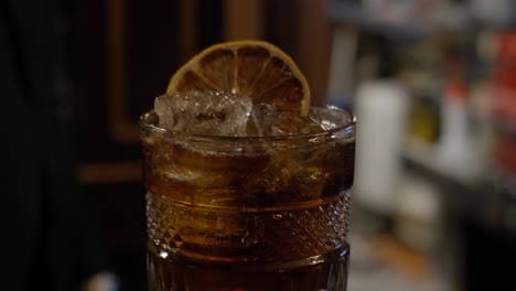 closeup of cuba libre drink in slow motion