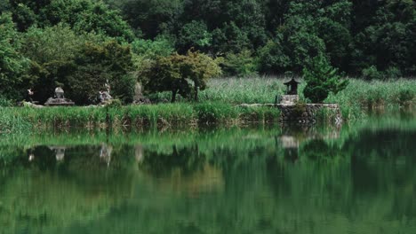 4k cinematic footage of japanese fisherman in front of a laac