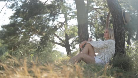 woman relaxing in a forest