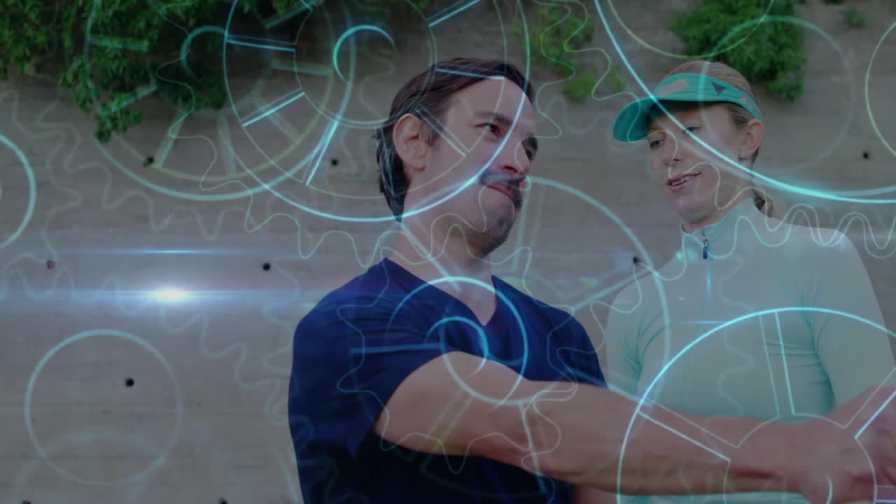 coach and trainee practicing tennis technique with racket on court, showing rotating gear overlay