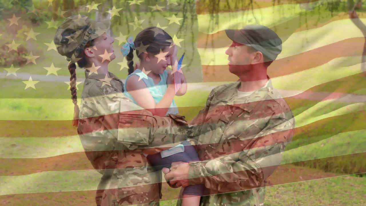 딸 을 안고 있는 군인 부부