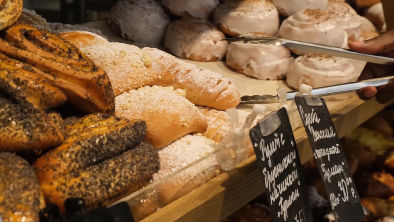 Customer shopping for pastries at a bakery