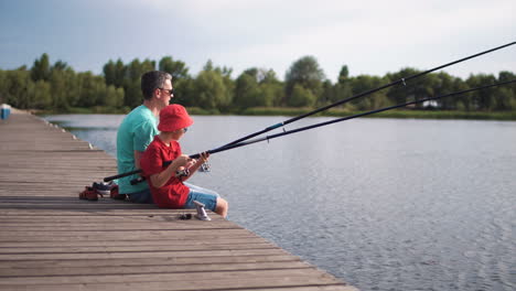 padre e hijo pescando